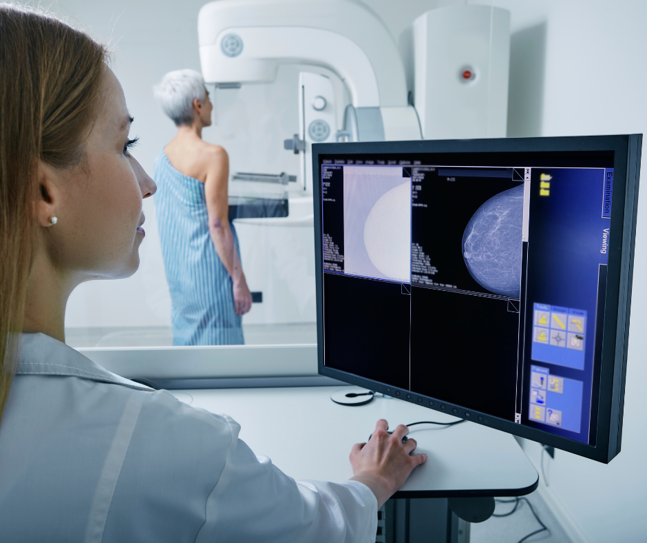 Female doctor review mammogram results.