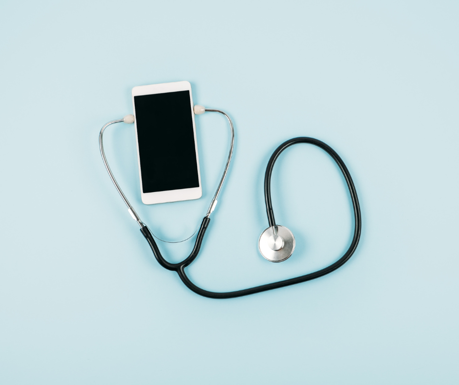 Smart phone wearing a stethoscope on a light teal background.